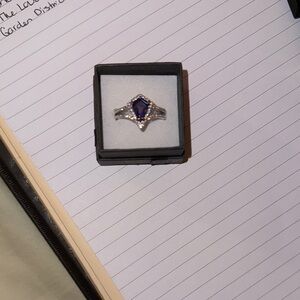 Elegant Silver and Purple Gemstone Ring